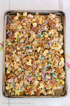 a pan filled with cereal and sprinkles