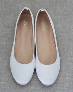 Contemporary and refined designed ballet inspired wedding flats. This smooth satin round toe flat brings comfortable simplicity and elegance to your wedding ceremony and/or reception, bridal party, date night, or everyday fancy wear. Available in 9 colorsDETAILS:COLORS AVAILABLE: Black, Burgundy, Champagne, Dusty Pink, Hunter Green, Ivory, Light Blue, Navy, and WhiteUPPER: Synthetic upper and liningMATERIALS: Manmade outsole STYLE: CASSIE White Shoes Flats, White Flat Dress Shoes, Dama Shoes, Cas Outfits, Wedding Flat Shoes, White Shoes Outfit, Purple Quince, Wedding Ballet Flats, White Ballet Flats