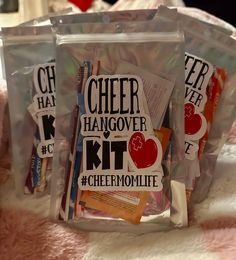 Each bag is 5x8 holographic resealable  Contains...  What you need to get through that cheer weekend. Cheer Goodie Bag Items, Cheer Coach Survival Kit, Cheer Team Mom Gift Ideas, Cheer Bonding Ideas, Cheer Mom Gift Ideas, Cheer Goodie Bag Ideas, Cheer Survival Kit, Cheer Camp Gifts