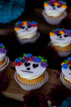 cupcakes decorated with sugar skulls and flowers