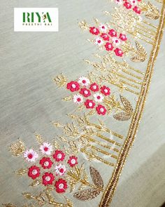 an embroidered fabric with flowers and leaves on the side, in gold and red colors