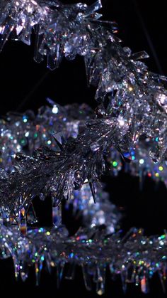 a close up view of some lights on a tree