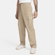 When your daily adventures call for lightweight, breathable comfort, pull on a pair of these cotton ripstop pants from our Nike Club collection. Cargo pockets offer plenty of storage while the relaxed straight-leg fit gives you a casual feel through the seat and thighs for easy, everyday wear. Nike Cargo Pants, Apparel Design Inspiration, Men's Cargo Pants, Ripstop Pants, Mens Cargo, Team Wear, Ripstop Fabric, Cargo Pants Men, Cargo Trousers