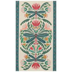 an intricately designed rug with flowers and leaves in green, red, yellow and orange colors