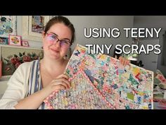 a woman holding up a piece of fabric with the words using teeny tiny scraps