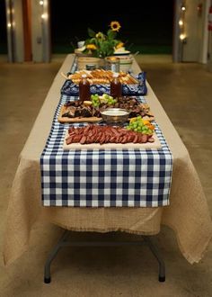 a long table covered with food and drinks