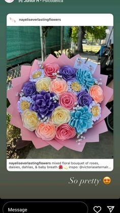 a bunch of flowers that are on top of a pink and blue flower bouquets