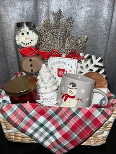 a basket filled with christmas items on top of a table