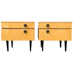 pair of mid century modern nightstands with black legs