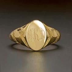 Featured here is an absolutely immaculate vintage inspired signet ring that is hand engraved with a contemporary take on Florentine engraving!Originating from the Latin word “signum” meaning “sign”, signet rings originated amongst the ruling classes and were historically marked with a unique family crest. These rings were used to mark and seal documents by pressing the face into hot wax. Signet rings were not only used as official signatures, but were so personal and specific to the individual t Classic Engraved Ring With Hallmarks, Classic 14k Gold Engraved Ring For Ceremonial Occasions, Classic Ceremonial Signet Ring With Polished Finish, Classic Hallmarked Signet Ring For Collectors, Classic Hallmarked Signet Ring Collectible, Classic Gold Oval Signet Ring, Classic 14k Gold Signet Ring For Ceremonial Occasions, Classic Engraved Signet Ring For Ceremonial Occasions, Classic Engraved Signet Ring For Ceremonial Use