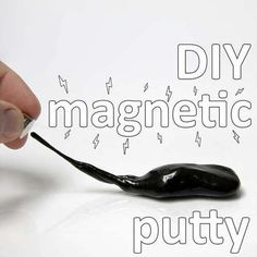 a hand holding a black pepper with the words diy magnetic putty on it