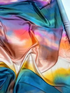 an image of a tie dyed fabric that looks like it has been dyed in different colors