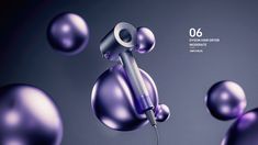 an electric hair dryer in the air surrounded by shiny purple balls and bubbles on a gray background