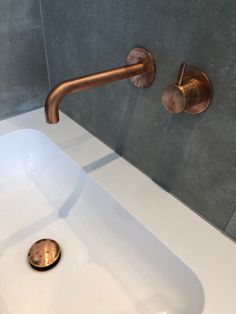 a bathroom sink with a faucet and soap dispenser