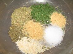 spices and herbs are mixed together in a bowl