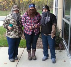 three people dressed up as ducky and lumber