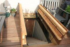 an outdoor kitchen built into the side of a deck