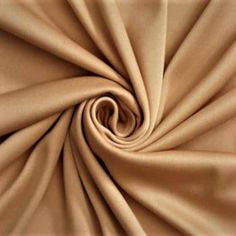 a close up view of a tan fabric