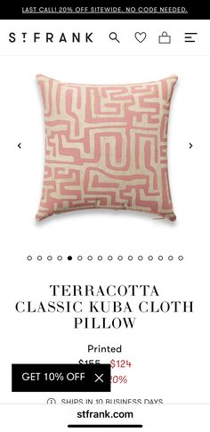 a pink and white pillow with the words terracotta classic club cloth on it