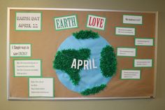 a bulletin board with the words earth and love written on it