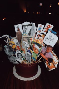 a cake decorated with pictures and stickers