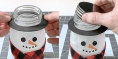 two hands holding mason jars with a snowman design on them, and one is wearing a top hat