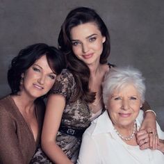 two women and an older woman are posing for a magazine advertiser's photo