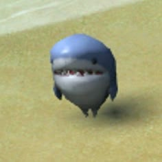 an animated shark with big teeth on the beach