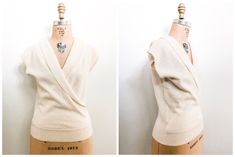 Lovely and versatile creamy ivory sweater has a cross cross shawl collar and ribbed hem. No content tag but feels like a pure wool or wool/angora blend. Circa mid to late 1970s. Great with high waisted jeans. I've shown this with the open side at front but there's no reason it couldn't be reversed and worn in the back. Will fit an extra small to small size: Bust 34 Length 22 One small nip at front near hem. Otherwise in excellent, clean condition. Ivory Sweater, September Wedding, Pullover Sweater Women, High Waisted Jeans, Shawl Collar, Dream Dress, Women Pullover, Vintage 70s, High Waist Jeans