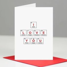 a greeting card with the words i love you in red, white and black letters