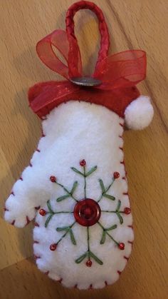 an ornament hanging from the side of a wooden table