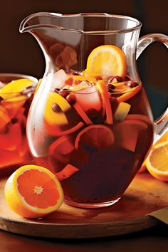 This pin showcases a vibrant Sangria Cocktail Recipe, highlighting its fruity and refreshing appeal. The images focus on the cocktail's balanced blend of wine and fruit flavors, derived from citrus fruits like oranges and lemons, alongside apples Easy Pitcher Cocktails, Spanish Cocktails, Wine And Fruit, Easy Sangria, Blackberry Sangria, Easy Sangria Recipes, How To Make Sangria, Sweet Cocktail, Pitcher Cocktails