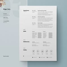 a clean and modern resume is displayed on a blue background with a flower in the corner