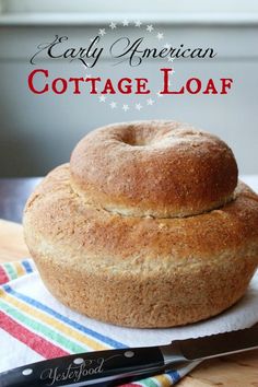 a loaf of bread sitting on top of a cutting board