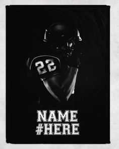 a black and white photo of a football player with the number 23 on his jersey