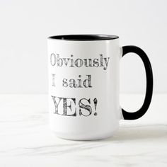 a black and white coffee mug with the words obviously i said yes