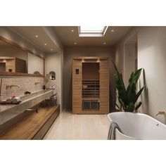 a bath room with a large tub and a sink