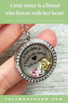 a hand holding a locke with two hearts on it and the words true sister is a friend