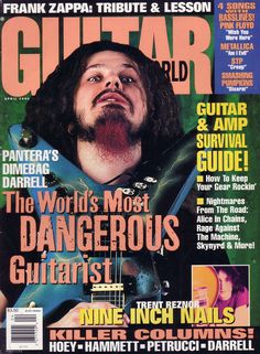 a man with long hair and beards on the cover of guitar world magazine,