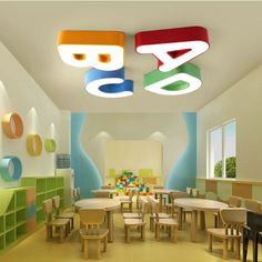 the children's playroom is decorated with colorful shapes and colors, such as letters