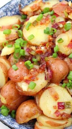 potatoes with bacon and green onions in a bowl