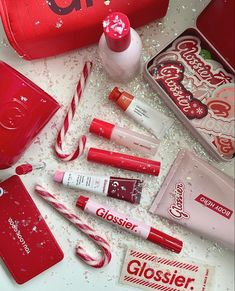 Glossier Thermos, Christmas Skincare Aesthetic, Christmas Self Care Aesthetic, Christmas Lip Gloss, Christmas Aesthetic Makeup, Glossier Cranberry, Christmas Makeup Aesthetic, Glossier Christmas, Glossier Kit