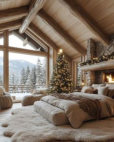 a bedroom decorated for christmas with a large bed and fireplace in the corner, surrounded by lights