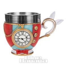 a coffee cup with a clock on the front and sides, decorated with gold chains