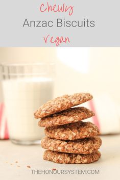 cookies stacked on top of each other with the words chewy anzac biscuits vegan