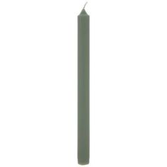 a single green candle on a white background