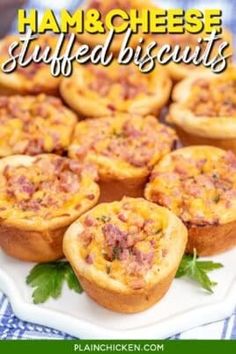 ham and cheese stuffed biscuits on a white plate with blue checkered table cloth