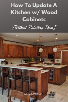 a kitchen with wooden cabinets and an island in the middle is surrounded by stools