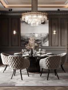 an elegant dining room with chandelier, chairs and art work on the wall