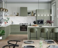 the kitchen is clean and ready to be used for dinner or lunchtime, with modern appliances